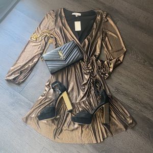 New with tags!   Bronze party dress.   Size medium Accessories not for sale ;)